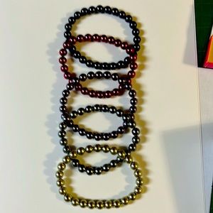 5 premier Designs stretchy bracelets that have never been worn.